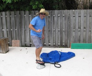 Two things we learn with this picture of George: It’s impossible to look cool pumping up a beer pong table – or wearing that hat.